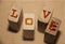 Love word on wooden blocks. Love romance devotion concept