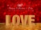 Love word wooden texture on red bokeh background for valentine\'s