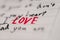 Love written on lined paper