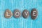 Love written on pebbles