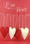 Love you with all my Heart message with red and cream hearts hanging from pegs on a line