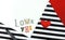 Love you - cut paper letter , red heart, declaration of love, combination of red black white colors,