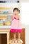 Lovely acting of little children dinning table in home kitchen r