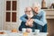 Lovely aged couple having French breakfast