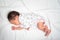 Lovely Asian baby infant sleeping on soft bed. portrait of newborn child.