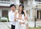 Lovely Asian family holding 1-month-old newborn baby boy on hand, Lovely