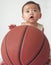 Lovely baby and basketball