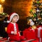 Lovely baby enjoy christmas. Santa boy little child celebrate christmas at home. Childhood memories. Family holiday. Boy