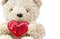 Lovely bear doll holding red heart shape