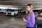 A Lovely Blonde Executive Assistant Walks To Her Car In A Covered Parking Deck After A Long Day