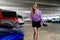 A Lovely Blonde Executive Assistant Walks To Her Car In A Covered Parking Deck After A Long Day