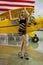 Lovely Blonde Model Poses With A Small General Aircraft