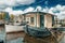 Lovely Blue House Boat on Sunny Lake