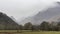 Lovely calm Winter morning landscape image of view across Manesty Park towards Castle Crag in the background