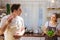 Lovely caucasian couple or lover in kitchen together