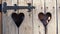 Lovely child eyes look through heart shaped hole in rustic wooden fence