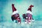 Lovely christmas snowman figures decoration against blue snowy background