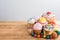 Lovely composition Russian Easter cakes in glaze on a wooden table with quail colored eggs