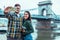 Lovely cople taking selfie bridge on background