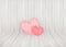 Lovely couple pink heart on wood wall background and copyspace