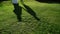 Lovely couple shadow. People walking outdoors in summer day. Silhouette of bride and groom hugging