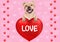Lovely dog hanging with paws on big valentine`s day heart with text Love on pink background with hearts and foot print