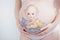 Lovely drawing on the stomach of a pregnant woman