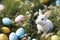 Lovely easter fluffy bunny on green lawn and easter eggs. Holiday concept,