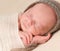 Lovely face of sleepy newborn baby