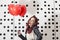 Lovely fashion girl with Valentine heart balloons