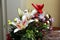 Lovely festive Christmas flower arrangement with lilies and carnations