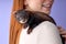 lovely funny domestic pet ferret on owner's shoulders.Woman and pet concept.