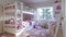 A Lovely Girl\\\'s Bedroom Adorned with a White Bunk Bed, Vibrant Pink Bedding, Treasured Toys, and a Cozy Carpet