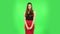 Lovely girl is very offended and looks away. Green screen