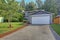 Lovely grey rambler house exterior features grey siding