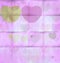 Lovely hearts on crumpled spilled old rose pink paper, Valentine`s Day