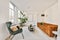 Lovely living room with brown velvet sofa and long lamp