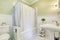 Lovely marble bathroom interior with full bath shower