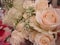 Lovely peach rose bouquet with cute baby breaths close up