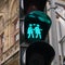 Lovely pedestrian traffic lights. Couple holding hands, green light. Vienna, Austria