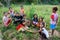 Lovely, pretty Asia children in countryside