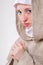 Lovely pure girl in monastic clothes and white scarf