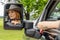 A Lovely Redhead Model Sits In Her Truck While Wearing A Cowboy Hat On Her Farm