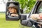 A Lovely Redhead Model Sits In Her Truck While Wearing A Cowboy Hat On Her Farm