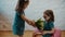 Lovely sisters give themselves flowers and a gift