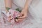 Lovely Soft Pink Flowers In Girl Hand On Nature Background