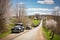 lovely spring day, with vintage vehicles on a scenic country road