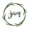 Lovely spring wreath with green leaves and modern brush lettering