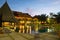 Lovely Sunset View at Pool Area with Nipa Hut Sunshade in a Tropical Beach Resort