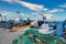 Lovely view of the harbor in Manfredonia, Italy with docked boats under a bright cloudy sky